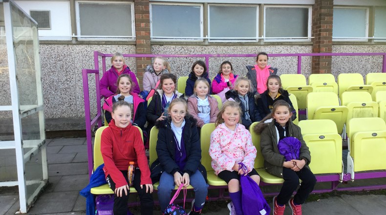 Girls attend football festival 